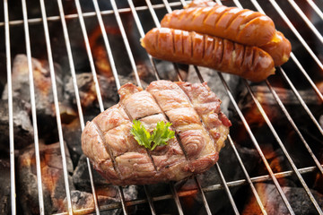 BBQ meat steak and sausages on the grill