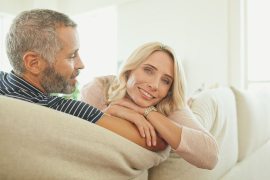 Couple relaxing on couch.
