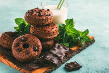 Chocolate doughnuts with milk