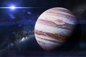 planet Jupiter in front of the Milky Way galaxy and the Sun © dottedyeti