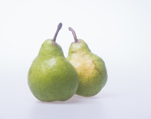pears or two green pears on a background.