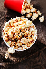 Homemade Kettle Corn Popcorn on wooden rustic table with copy space .