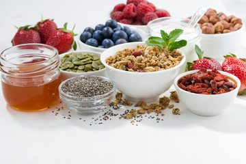 foods for healthy nutrition and breakfast on white table