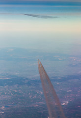 Jet fast flying in sky over Europe view from top