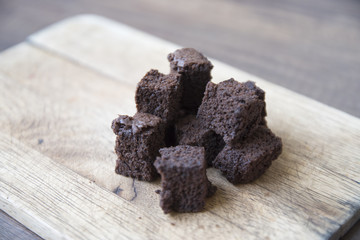 chocolate brownies on wooden board