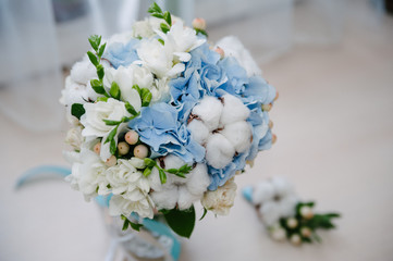 Delicate marriage bouquet with bow