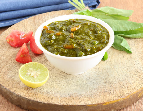 Palak curry, an Indian vegetarian food made from spinach, carrot and other items, is a healthy side dish for cuisines like chapati and roti.