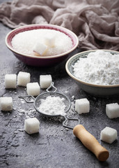 Sugar and powder on concrete background