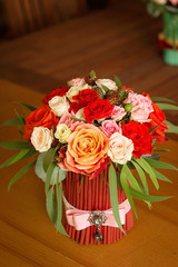 Tenderless bouquet in gaudy red and orange colours