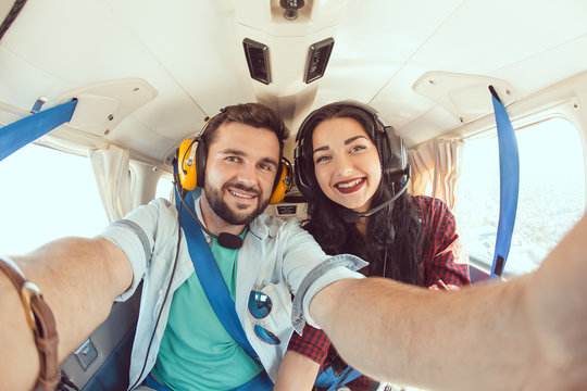 Young couple in airplane