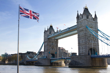 Fototapeta na wymiar London Tower Bridge and British flags in UK
