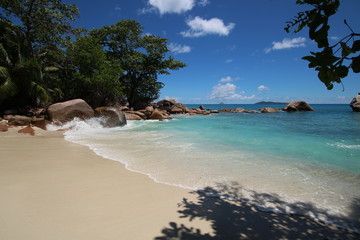 Beach Anse Lazio, Praslin Island, Seychelles, Indian Ocean, Africa / The beautiful white sandy beach is bordered by large red granite rocks.