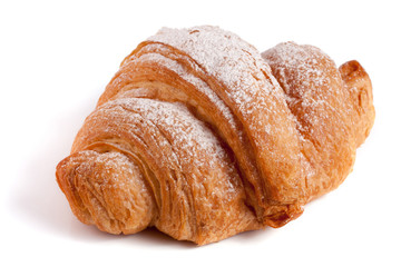 one croissant sprinkled with powdered sugar isolated on a white background closeup