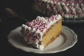 Cake with a beautiful decoration of cream (pink and white) 