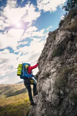 Door stickers Mountaineering Climbers reaches the top of mountain peak. Climbing and mountaineering sport