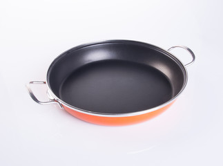 pan or stainless steel pan on background.