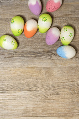 Easter eggs on rustic wood