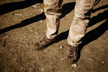 Close-up of dirty trekking boots