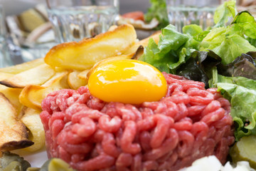 tasty Steak tartare (Raw beef) - classic steak tartare on white plate