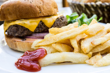Cheese burger - American cheese burger with Golden French fries