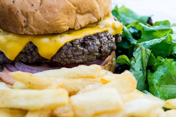 Cheese burger - American cheese burger with Golden French fries