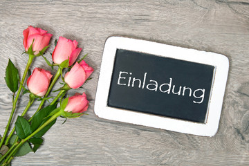 Naklejka premium Rosen und Tafel: Einladung