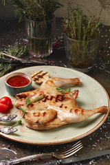 Chicken grilled with hot sauce and garlic, author's dish.