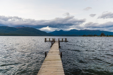 Fototapeta premium Wooden jetty at the mountain lake