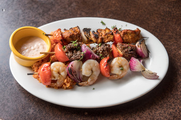 beef , fork and shrimp Barbecue with source 