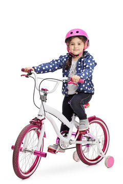 Cute little girl on a bike