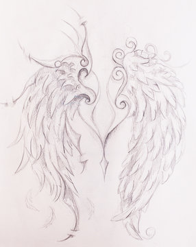 Pencil drawing on old paper. angel wings.