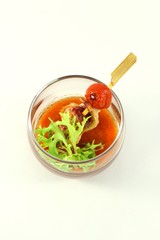 Fish canapé from a mullet in hot tomato sauce