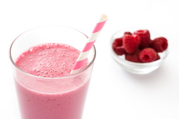 Raspberry smoothie isolated on white background
