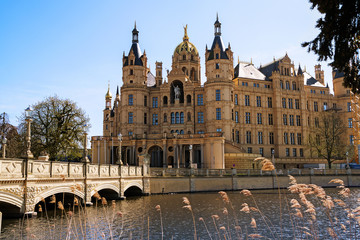 Fototapeta na wymiar Schwerin Palace, or Schwerin Castle, palatial schloss on an island in the lake, romantic historicism architecture, Mecklenburg-Vorpommern, northern Germany, Europe