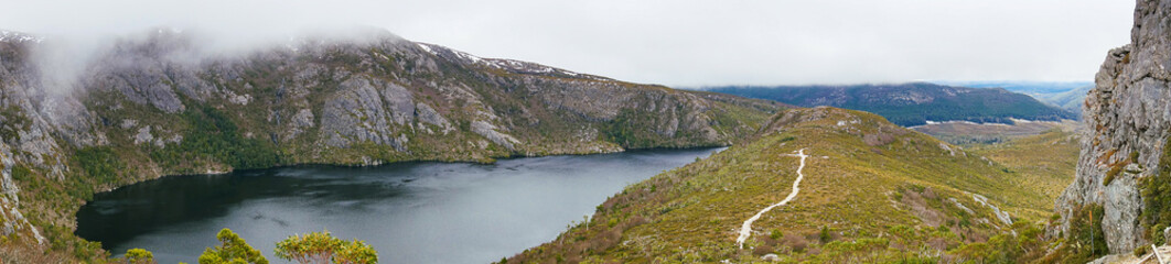 Panorama of mountain peak with lake