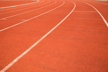 Fototapeta premium Curved range of Athletics track in sport stadium