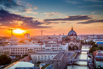 Berlin rooftops view with Berlin Cathedral and Spree river at sunset, Germany