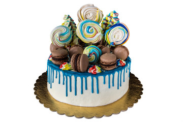 cake with meringue (kisses) and macaroons isolated on white background