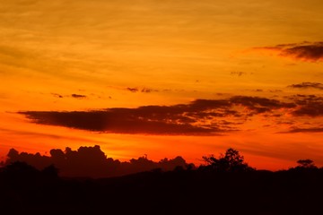 sunset beautiful colorful landscape and silhouette tree mountain in sky twilight time