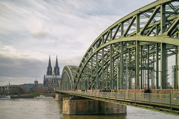 View on Cologne Cathedral and Hohenzollern Bridge over the Rhine river,