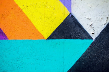 Graffiti-Wand. Abstraktes Detail der Urban Street Art Design Nahaufnahme. Moderne ikonische urbane Kultur. Aerosol-Bilder. Kann für Hintergründe nützlich sein.