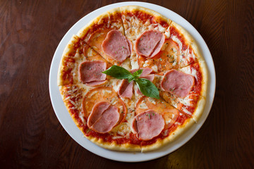 Salami pizza on a table