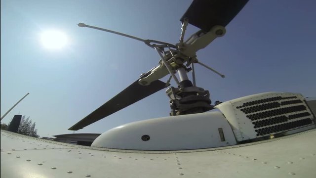 close up helicopter main rotor and blade movement and rotate