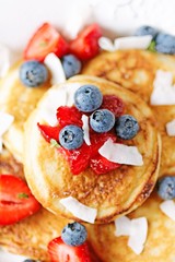 Coconut pancakes with berries