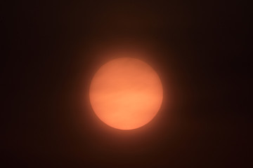 Big Sun and cloud in the evening.