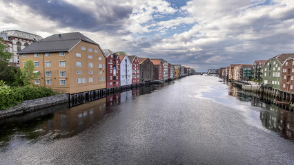 Old store houses on the river Nidelva in Old Town, Trondheim, Norway