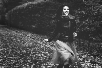 young girl running in park