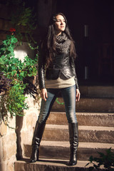 young girl standing on stairs outdoor