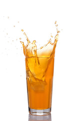 Splash in glass of orange juice with ice