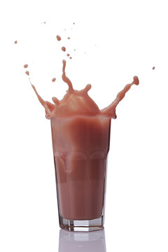 .Splash in glass of sweet chocolate milk